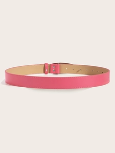 Detailed close-up of pink leather belt featuring double metal buckles and multiple holes