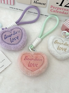 Colorful plush heart keychains with Boundless Love embroidery and woven lanyards