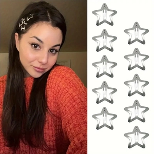 Set of 10 silver pentagram star hair clips shown worn and in a neat flat lay arrangement