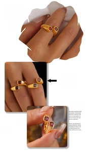 Macro detail of gold vintage geometric ring featuring red zircon and textured metal band