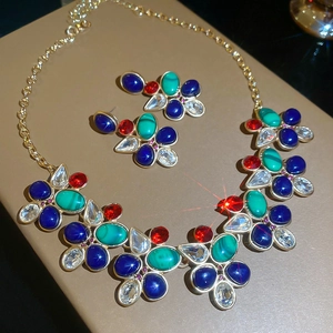 Vintage gold jewelry set with colorful gemstone waterdrop pendants and earrings