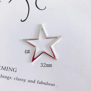 Detailed view of 32mm silver hollow star charm for DIY jewelry making and earring design