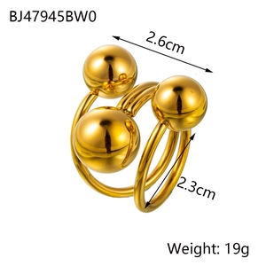 Detailed view of vintage gold titanium steel triple ball ring with size and weight specs