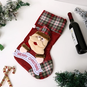 Detail of Christmas stocking featuring a 3D Santa Claus and Merry Christmas banner