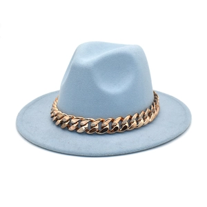 Detail of light blue wool fedora with thick rose gold chain link and flat brim