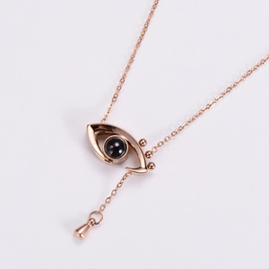 Rose gold angel eye necklace with black projection stone and LOVE engraving