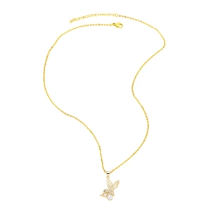 Detail of gold hummingbird pendant featuring sparkling crystals and a faux pearl drop