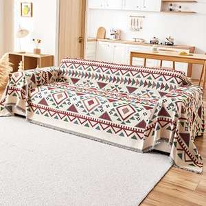 Close-up of thick flannel sofa cover featuring a colorful ethnic geometric pattern design