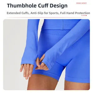 Detail of blue ribbed yoga jacket showing thumbhole cuffs and slim fit seamless fabric