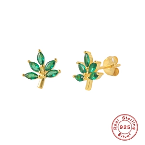 Detail of 925 sterling silver leaf stud earrings with green marquise-cut zircon stones