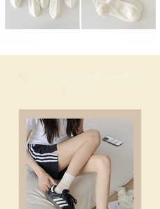 Detail of white hollow-out knit mid-tube socks with delicate Japanese casual style texture