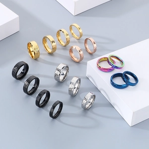Textured titanium steel rings with hammer finish in multiple colors and widths