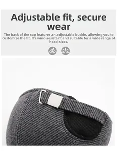 Detail of adjustable metal buckle and eyelet on men's gray winter baseball cap