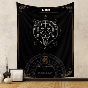 Detail of Leo zodiac tapestry featuring golden lion geometry on black fabric background
