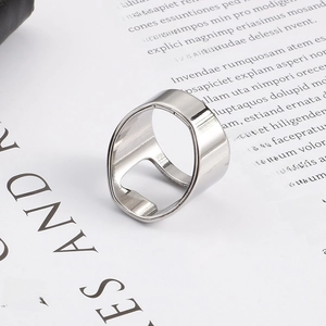 Polished silver stainless steel bottle opener ring shown at a 45-degree angle