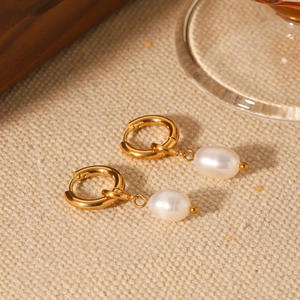 Elegant gold titanium steel hoop earrings with hanging white freshwater pearls for women
