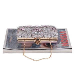 Pink satin evening clutch bag with crystal floral embroidery and gold chain strap