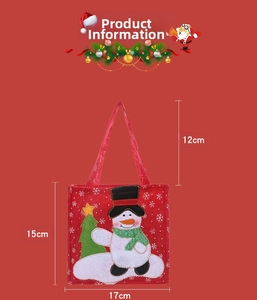 Detailed view of red Christmas felt gift bag with snowman embroidery and dimensions