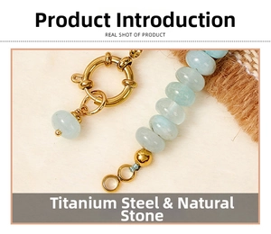 Macro shot of gold-plated titanium steel clasp and light blue natural stone beads