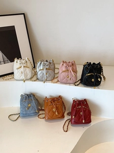 Mini quilted camellia bucket bags with gold chain straps in seven vibrant colors