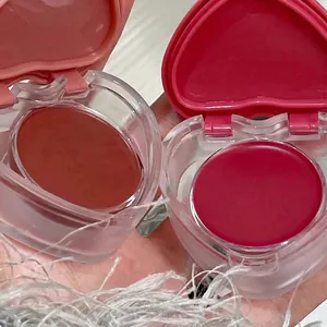 Matte lip and cheek mud in heart-shaped cases featuring deep red and rosy pink shades