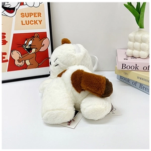 Detail view of plush cat backpack featuring a white fuzzy texture and premium zipper