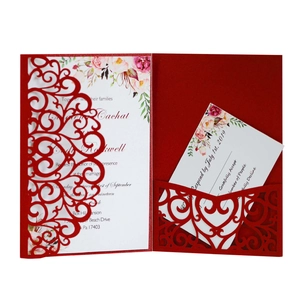 Elegant red laser cut wedding invitation set with floral patterns and pearl paper