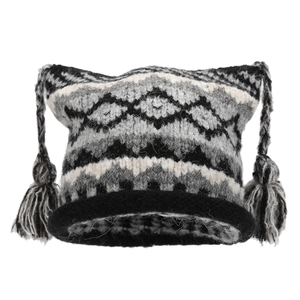 Fair Isle pattern knit hat with cat ear shape and handmade tassels on white background