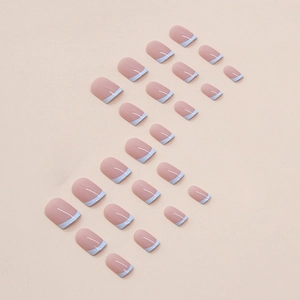 Short French press-on nails with light blue tips and natural nude base, 24-piece set