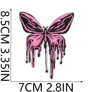 Detail of pink and black fluid butterfly embroidery patch with dimensions 8.5x7cm