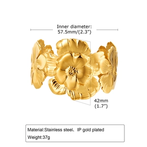 Detail view of gold floral cuff bracelet with 57.5mm diameter and 42mm width