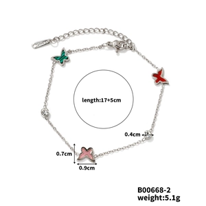 Detail showing butterfly charm bracelet dimensions 17 plus 5cm with enamel butterflies