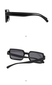Detail view showing side and rear profiles of black rectangular polished sunglasses