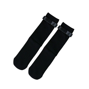 Black mid-calf JK socks with sweet bow detail, perfect for Mary Jane shoes