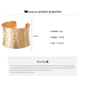 Detailed view of paisley embossed wide golden iron cuff bracelet with specs and measurements