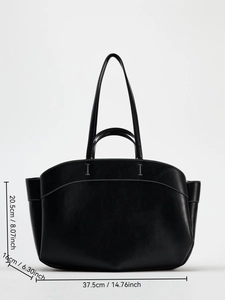 Detailed dimensions of black faux leather tote bag with white contrast stitching