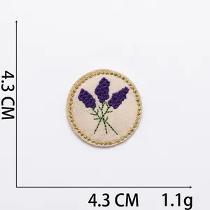 Detail of round lavender embroidery patch with gold thread edge, 4.3 CM diameter