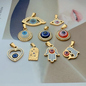 Golden stainless steel evil eye pendants set with rhinestone details for DIY necklaces
