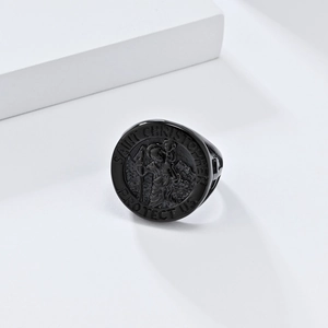 Detailed macro view of black stainless steel Saint Christopher signet ring for men