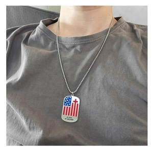 Detail of cross and American flag dog tag necklace with My Son My Soldier engraving