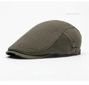 Detail view of military green cotton beret with adjustable metal side buckle