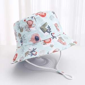 Detail of mint green kids bucket hat with animal prints and adjustable windproof rope