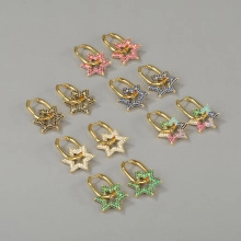 Set of six pairs of gold star hoop earrings with colorful pavé cubic zirconia accents