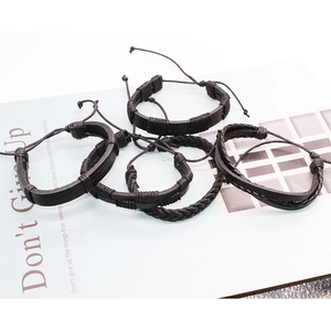 Set of five handmade black braided leather bracelets with adjustable sliding knots
