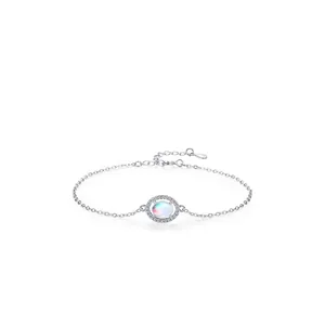 Elegant S925 sterling silver bracelet featuring an oval moonstone with shimmering halo