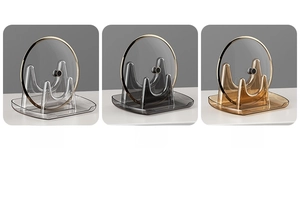 Three premium acrylic lid holders in clear, grey and amber colors for kitchen storage