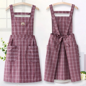 Pink checkered cotton apron with bear patch, dual pockets and back bow tie detail