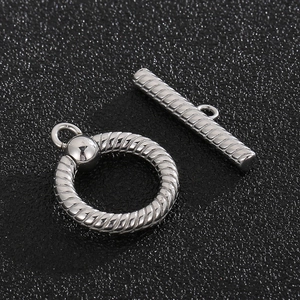 Macro shot of silver stainless steel twisted rope texture toggle clasp for jewelry making