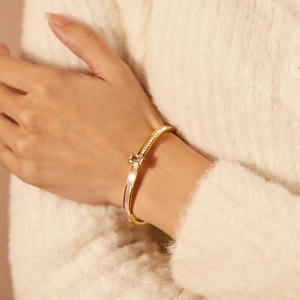 Elegant gold-plated stainless steel cuff bracelet with rectangular zircon and pave stones