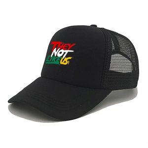 Black trucker hat with THEY NOT LIKE US text featuring breathable mesh and curved brim